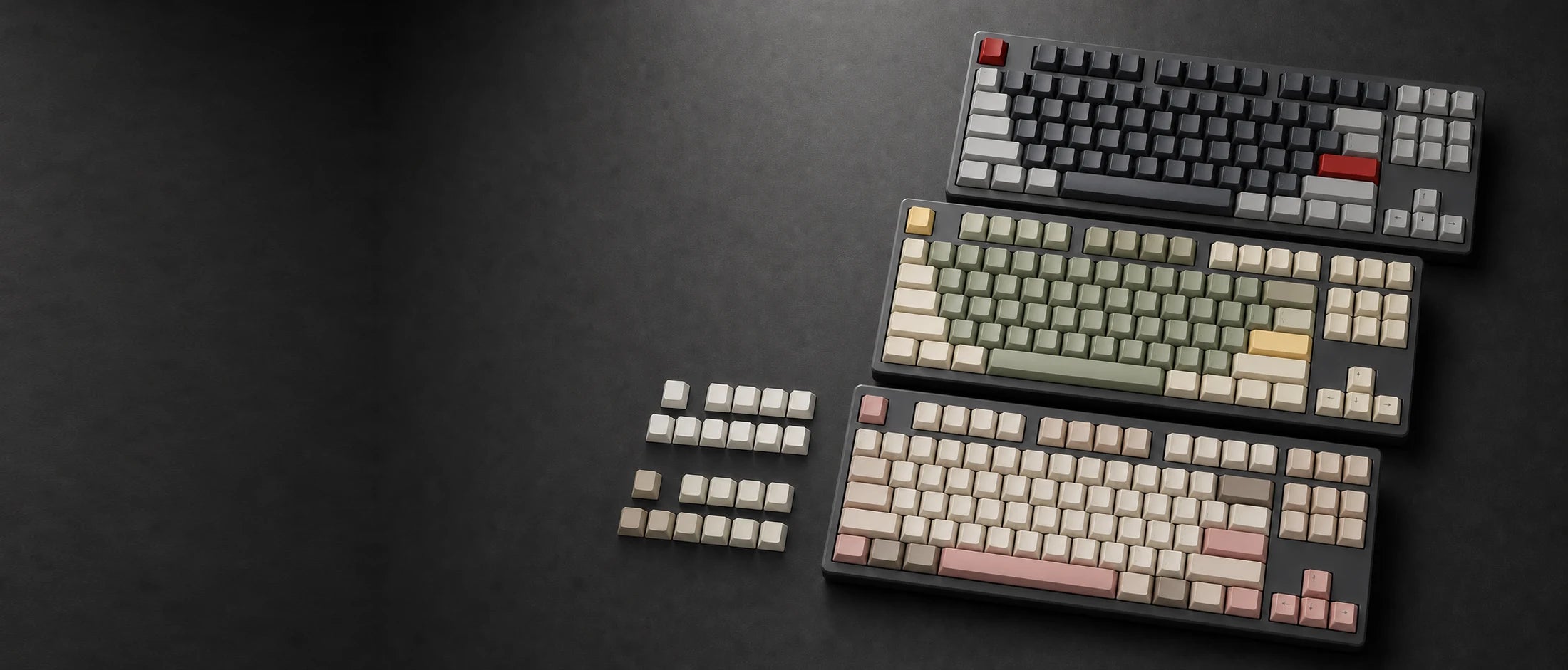GEEKZEUS PBT keycap colorway collection on three TKL mechanical keyboards